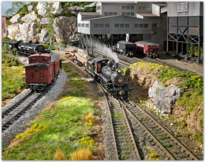 Locomotive with log cars