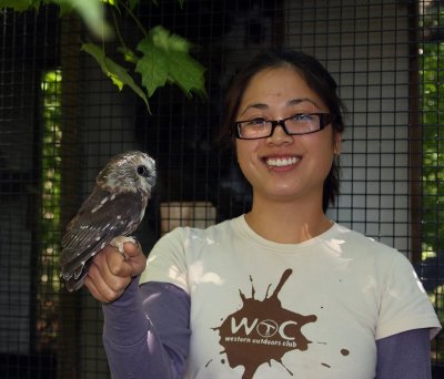 Michelle gets the tour and holds Bella our educational saw whet owl