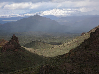 Four Peaks enshrouded in snow clouds