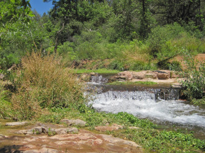 Falls leading to a spring-fed pool