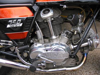 Hydraulic clutch line entering engine case