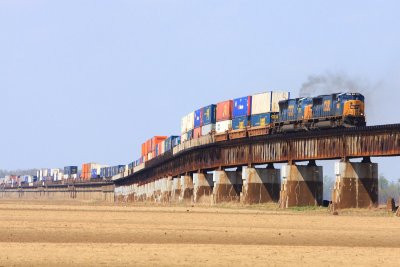 Nice power on this SB intermodal prompted a trip to Rahm for some more shots. The water had temporarily receded, but was under water again within a week