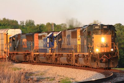 A new SD40-3 leads WB train Q244 towards Henderson on the Texas line