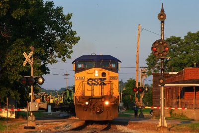 A work train catches evening sun as it heads west on the former B&O out of Vincennes
