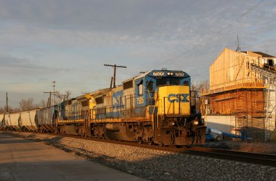 G198 arrives in Evansville, bathing in the late afternoon sun. The train went in to emergency about 1000' ahead. Fortunately the air came back up and the train made it in to Howell.