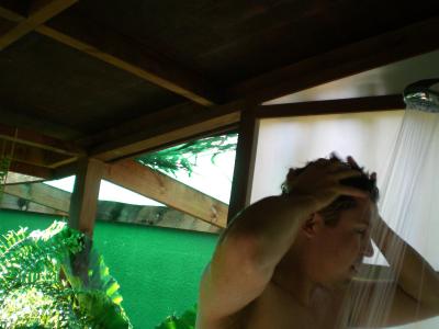 Shh...sneaking up on Dan in the garden shower