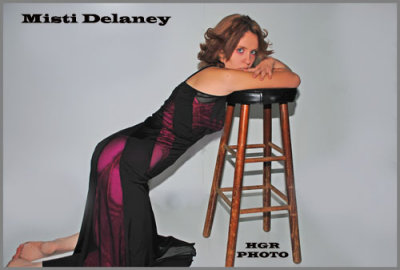 HGRP Model Misti Delaney Leaning on tall stool.jpg