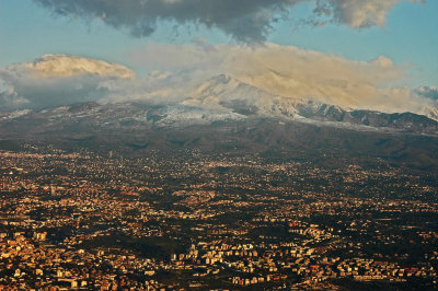 Airplane view of Mt. Etna and Catania, Italy