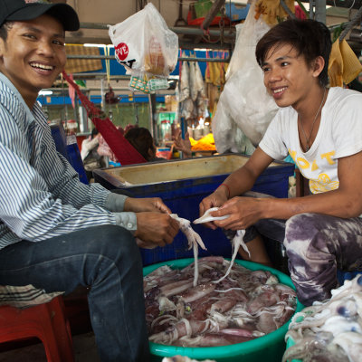 Cleaning squid at the market in Phnom Penh - Cambodia.jpg