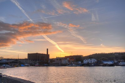 Sunset and vapour trails.