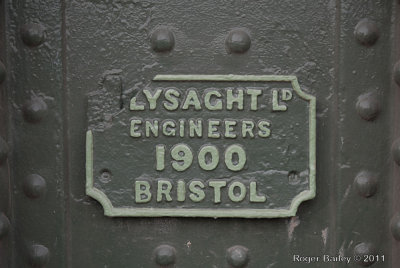 Sign on footbridge over the River Avon.