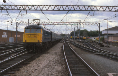 Class 86 northbound pulls into Carlisle 1986.