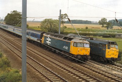 Class 47 442 passes a Class 31 at Newsham August 1989.