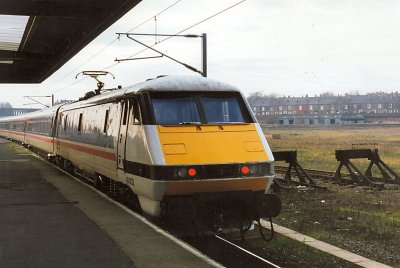 Class 91003  trailing power car leaving York for Kings Cross.