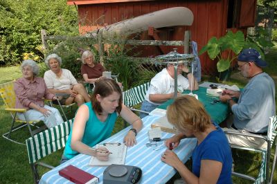 Erin, Sue, Mark and Martha at the banding station at the Lesser's