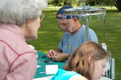 Visitor watches banding process