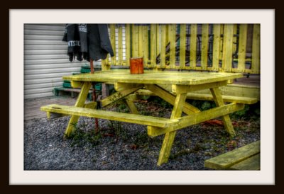 Old Yellow Picnic Table