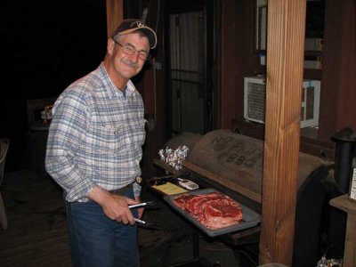 Phil getting the steaks primed