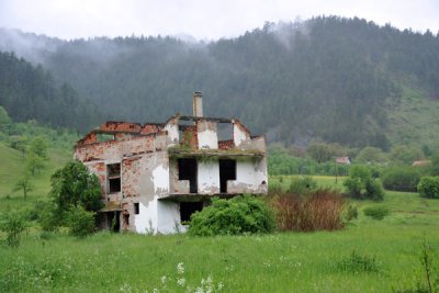 The Bosnian countryside is still littered with war damaged homes 16 years after the war ended