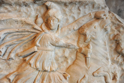 The god Mithras slaying the bull as a symbol for death and reincarnation