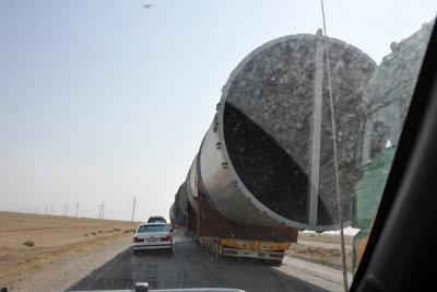 Wide Load - a convoy of trucks carrying massive pipes across Turkmenistan