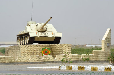 Tank on static display along the highway near city of Tejen