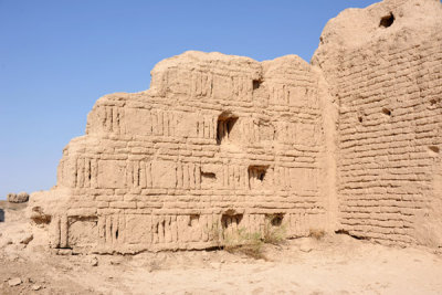 A building in the Shahryar Ark with ornate vertical brickwork