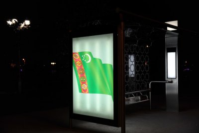 Turkmenistan flag adorning an Ashgabat bus stop