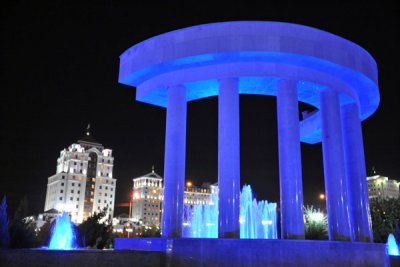 Independence Park fountain bathed in blue