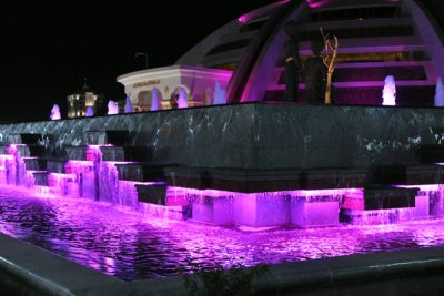 Colorful fountains around the Independence Monument