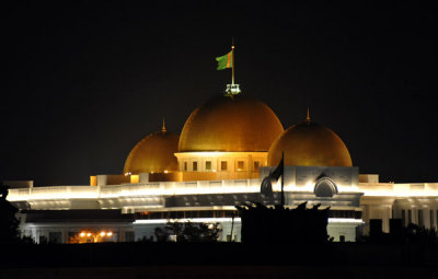 Three gold domes of the Turkmenistan Presidential Administration