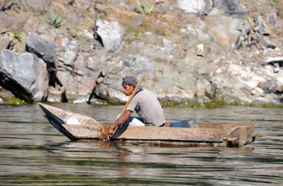 Young fisherman in a blank-built canoe, Tzununa, Lago de Atitln