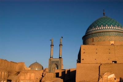 Jameh mosque in the morning from Silk Road Hotel with dome of Bogheh-ye Seyed Roknaddin