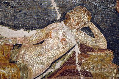 Mosaic detail of reclining woman