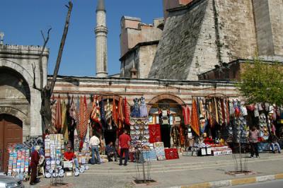 Shops built into the outer walls of the Aya Sofya along Babihümayun Cad