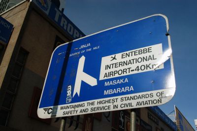 Roadsign along Kampala Rd for Jinja, Source of the Nile and Entebbe International Airport