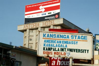 Signposts scattered around the chaotic appearing taxi park note destinations