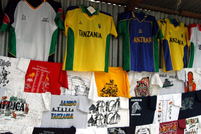 Numerous sidewalk stalls sell t-shirts along Samora Avenue, Dar es Salaam