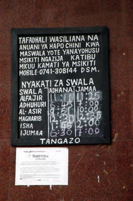 Prayer times posted at the mosque in Dar es Salaam