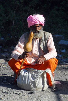 Snake charmer waiting for foreign tourists, Pokhara Lakeside