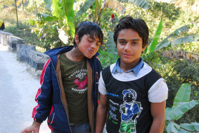 Nepali boys smoking on the side of the road