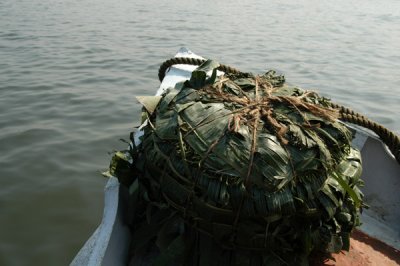 Some of the cargo on our boat - a giant bale of what looks like banana leaves