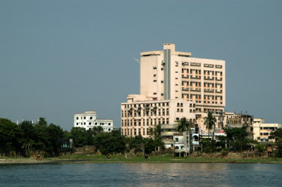 Large industrial buildings on R810 along the river in Dhaka-Shaympur