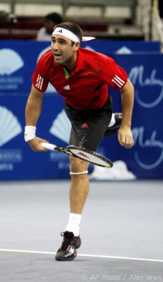 ATP2011-2R-Baghdatis-Devvarmant-09s.jpg
