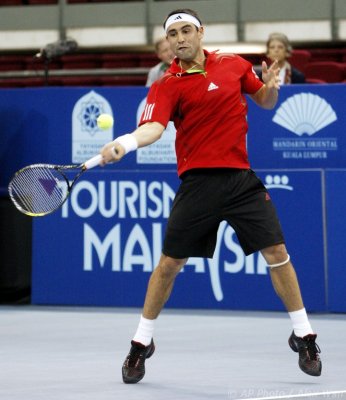 ATP2011-2R-Baghdatis-Devvarmant-22s.jpg
