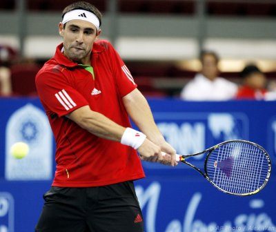 ATP2011-2R-Baghdatis-Devvarmant-45s.jpg