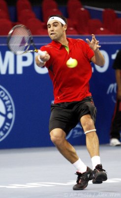 ATP2011-2R-Baghdatis-Devvarmant-74s.jpg