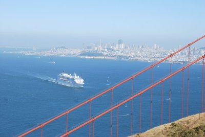 cruise ship, the city, and the bridge
