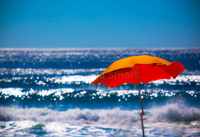 Orange umbrella at Manly Beach