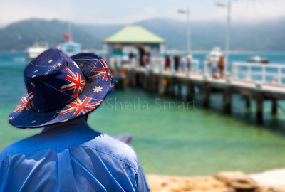 Man wearing Australian flag hat at Palm Beach Wharf